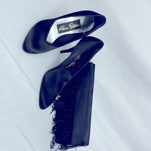 Peau D' soir black vintage pumps and black feather purse